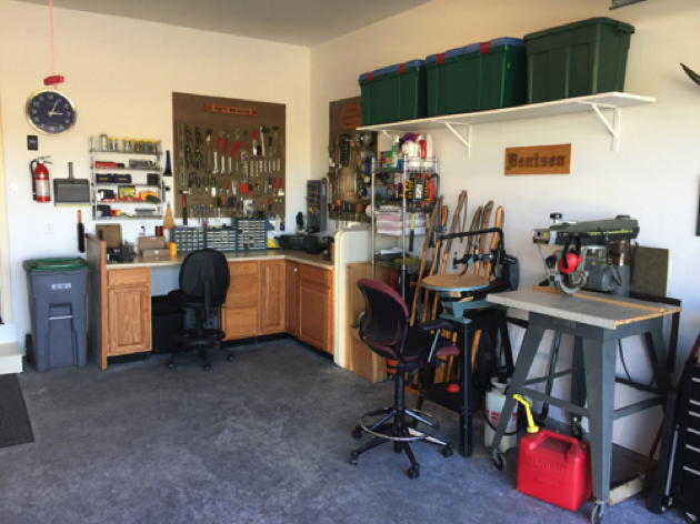 Garage Workshop with cabinets and pegboards.
High shelving on side walls and 16 AC outlets!